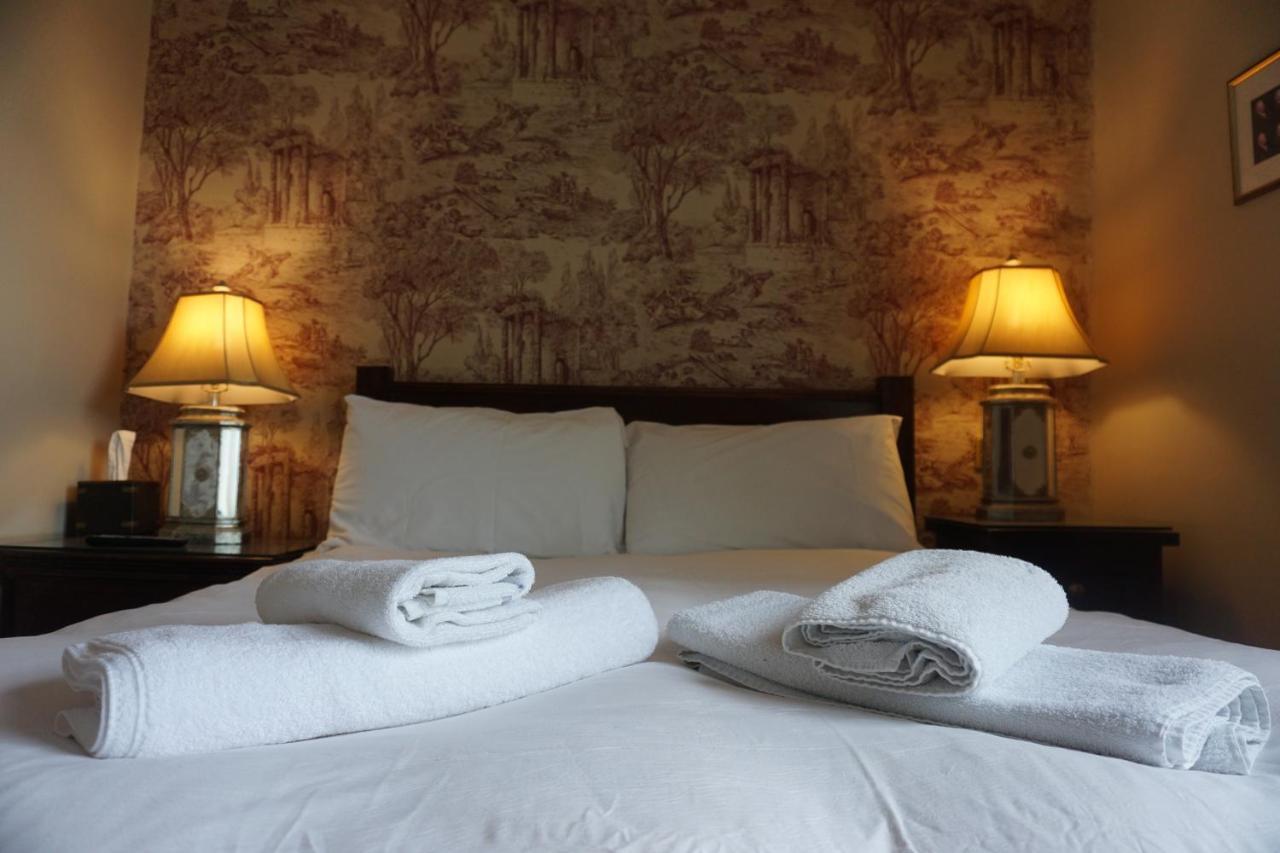 The Pembroke Arms Hotell Wilton  Rom bilde